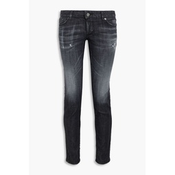 Distressed faded low-rise skinny jeans