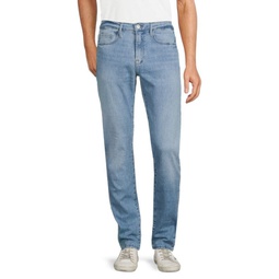 Mid Rise Distressed Slim Fit Jeans