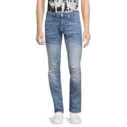 Mid Rise Distressed Slim Fit Jeans