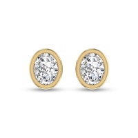 lab grown 1/2 ctw oval bezel set solitaire diamond earrings in 14k yellow gold