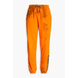Tie-dyed cotton-terry track pants