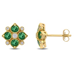 womens 3/4ct tgw emerald and 1/8ct tw diamond floral stud earrings in 14k yellow gold