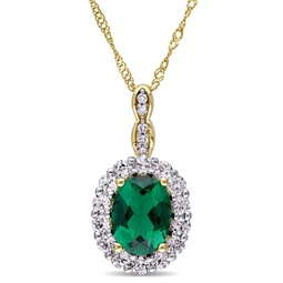 womens 1 5/8ct tgw oval shape created emerald, white topaz, and diamond accent vintage pendant with chain in 14k yellow gold