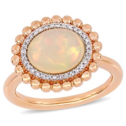 2 3/4 ct tgw oval-cut ethiopian blue-hued opal and 1/10 ct tw diamond halo ring in 14k rose gold