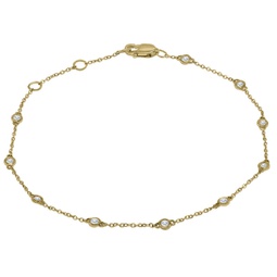 1/4 carat tw bezel set genuine diamond station bracelet in 14k yellow gold