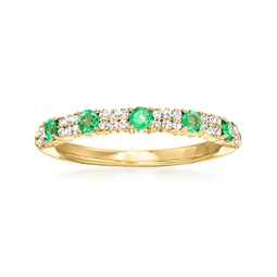 emerald and . diamond ring in 18kt yellow gold