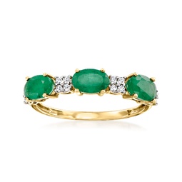 emerald and . diamond ring in 14kt yellow gold