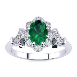1 carat oval shape emerald and halo diamond vintage ring in 14 karat white gold