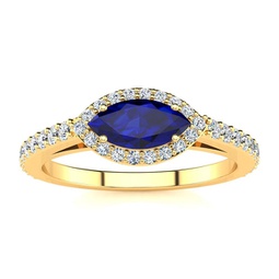 1 carat marquise shape sapphire and halo diamond ring in 14 karat yellow gold