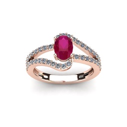 1 1/3 carat oval shape ruby and fancy diamond ring in 14 karat rose gold