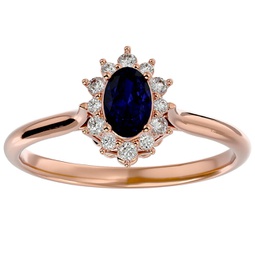 3/4 carat oval shape sapphire and halo diamond ring in 14 karat rose gold