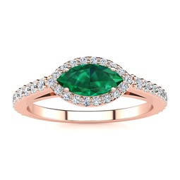 3/4 carat marquise shape emerald and halo diamond ring in 14 karat rose gold
