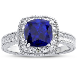1 1/4 carat cushion cut created sapphire and halo diamond ring in sterling silver