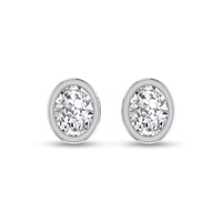 lab grown 3/4 carat oval bezel set solitaire diamond earrings in 14k white gold