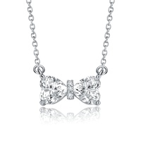 sterling silver with 1.50ctw lab created moissanite bow-tie heart pendant layering necklace