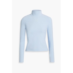 Appliqued stretch-knit turtleneck top