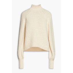 Boucle-knit cotton-blend turtleneck sweater