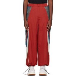 Red Paneled Track Pants 241039M191012