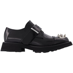 loafers with studs in black leather