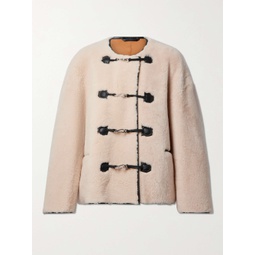 TOTEME Leather-trimmed shearling jacket