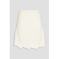 Guipure lace-trimmed ribbed wool mini skirt