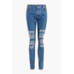 Skinny-fit distressed embellished denim jeans