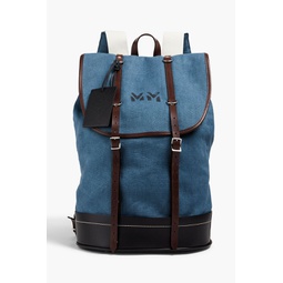 Leather-trimmed printed canvas backpack
