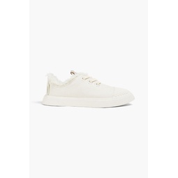 Frayed canvas sneakers