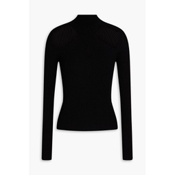 Cutout ribbed and cable-knit turtleneck sweater