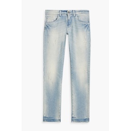 Skinny-fit distressed denim jeans